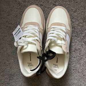 Tan and cream sneakers